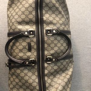 Authentic Large Gucci carry-on Duffle bag.